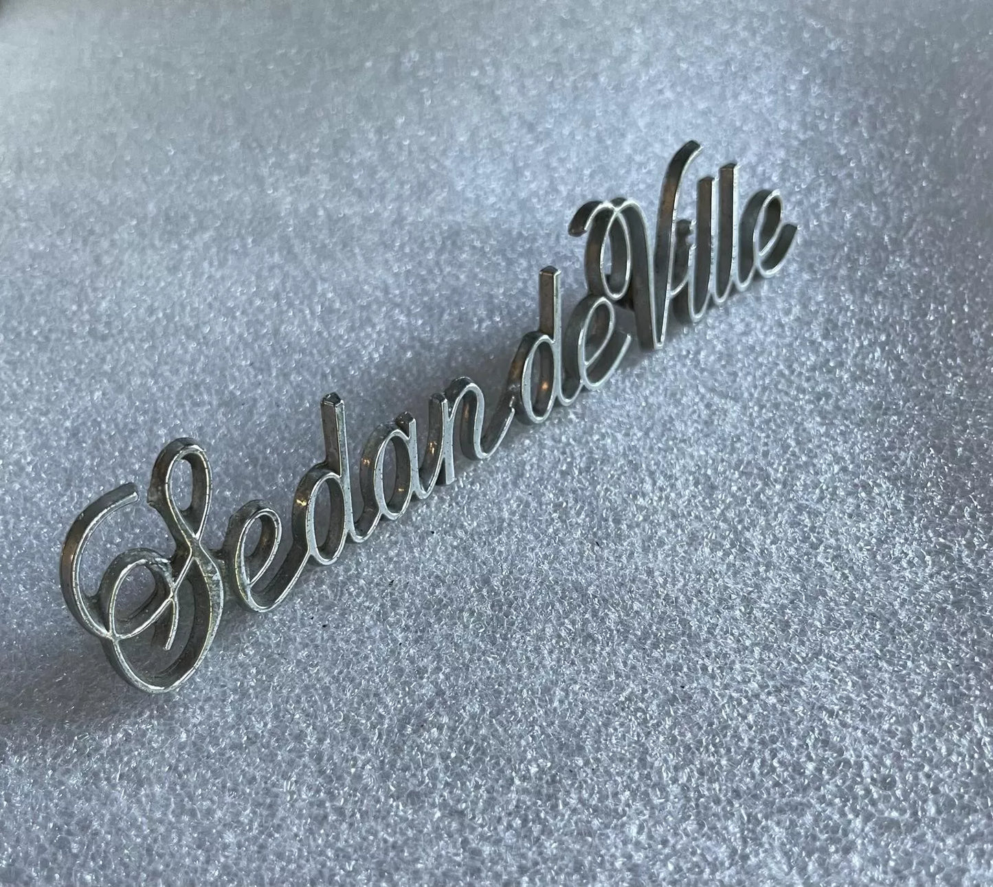 Cadillac Sedan de Ville Trunk Emblem Badge Decal Logo Script OEM