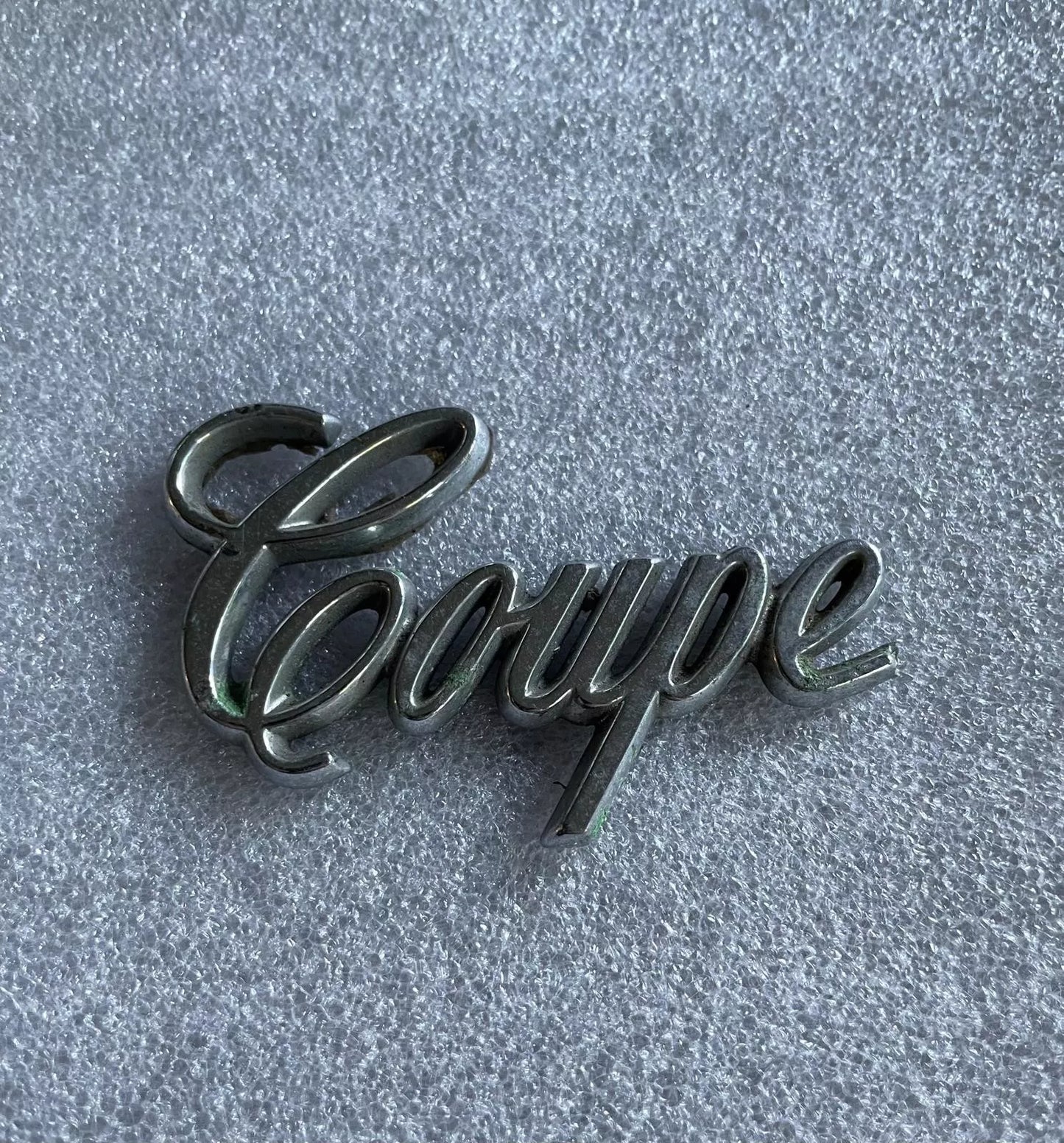 1977-1979 Cadillac Coupe Script Emblem