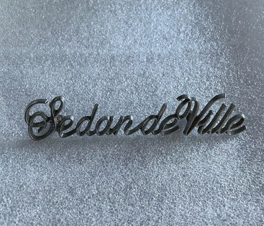 Cadillac Sedan de Ville Trunk Emblem Badge Decal Logo Script OEM